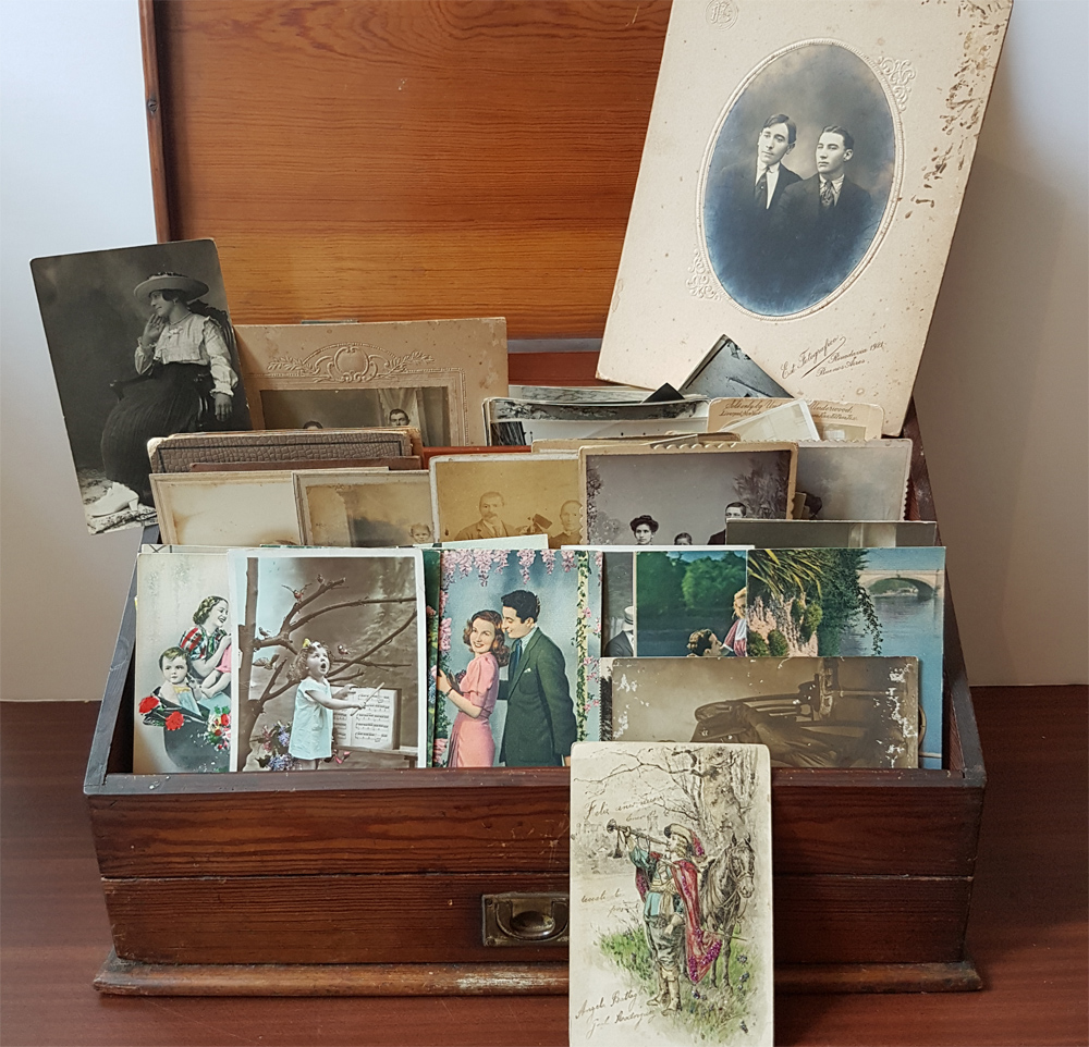 vintage postcards in wooden box