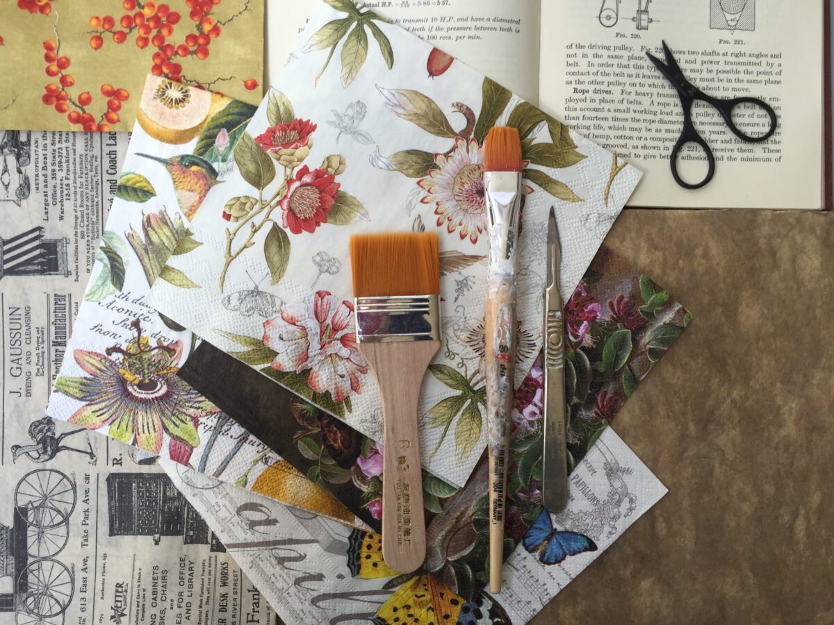 papers suitable for decoupage, paint brushes, scissors